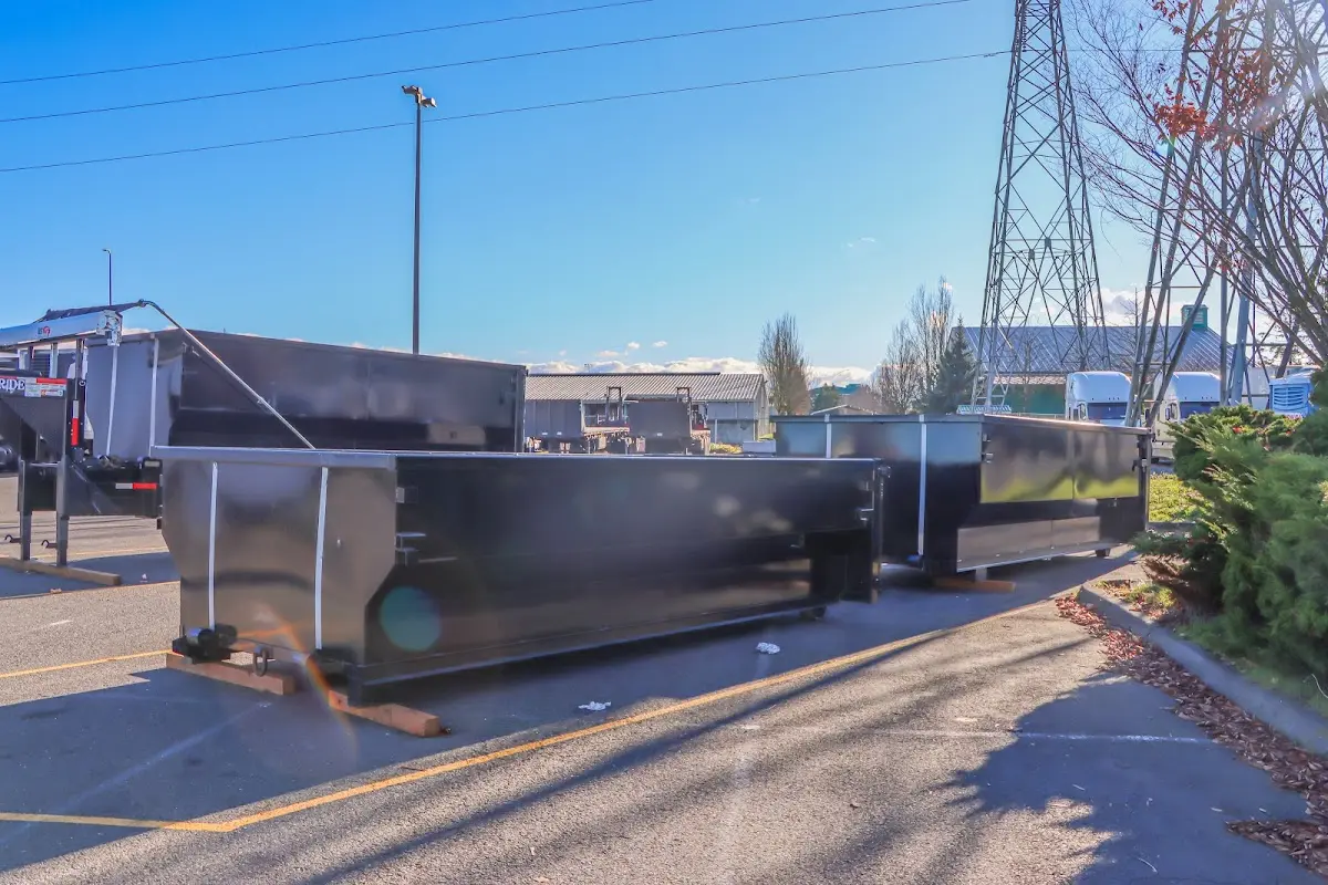 Roll-off dumpster ready for waste disposal at job site for Construction Dumpster Rental in Henderson